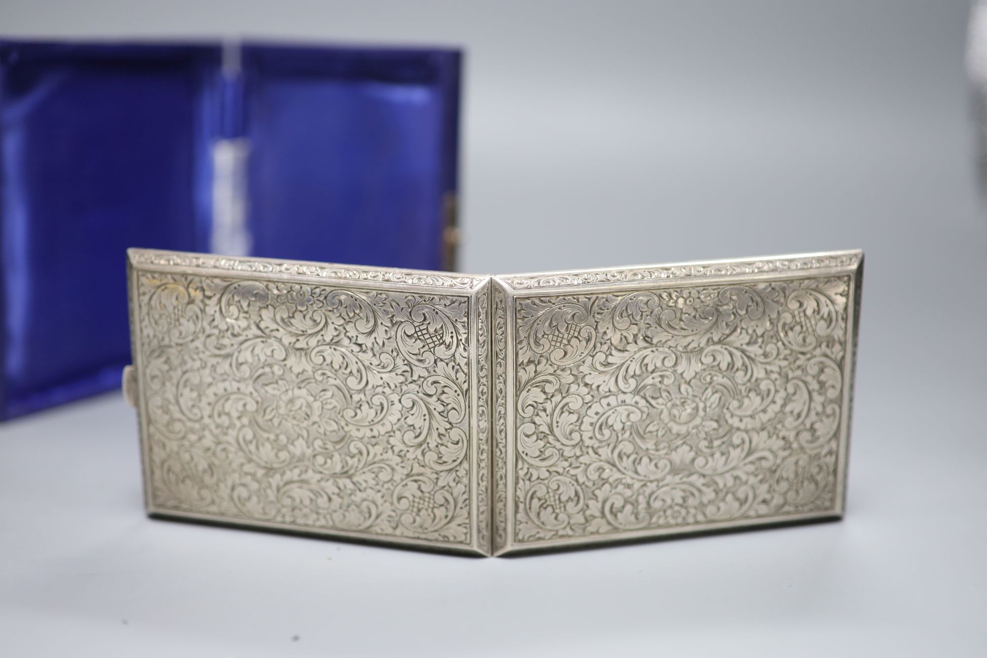 A 20th century Austrian engraved 900 standard white metal cigarette case, 10.3cm, gross 5oz.